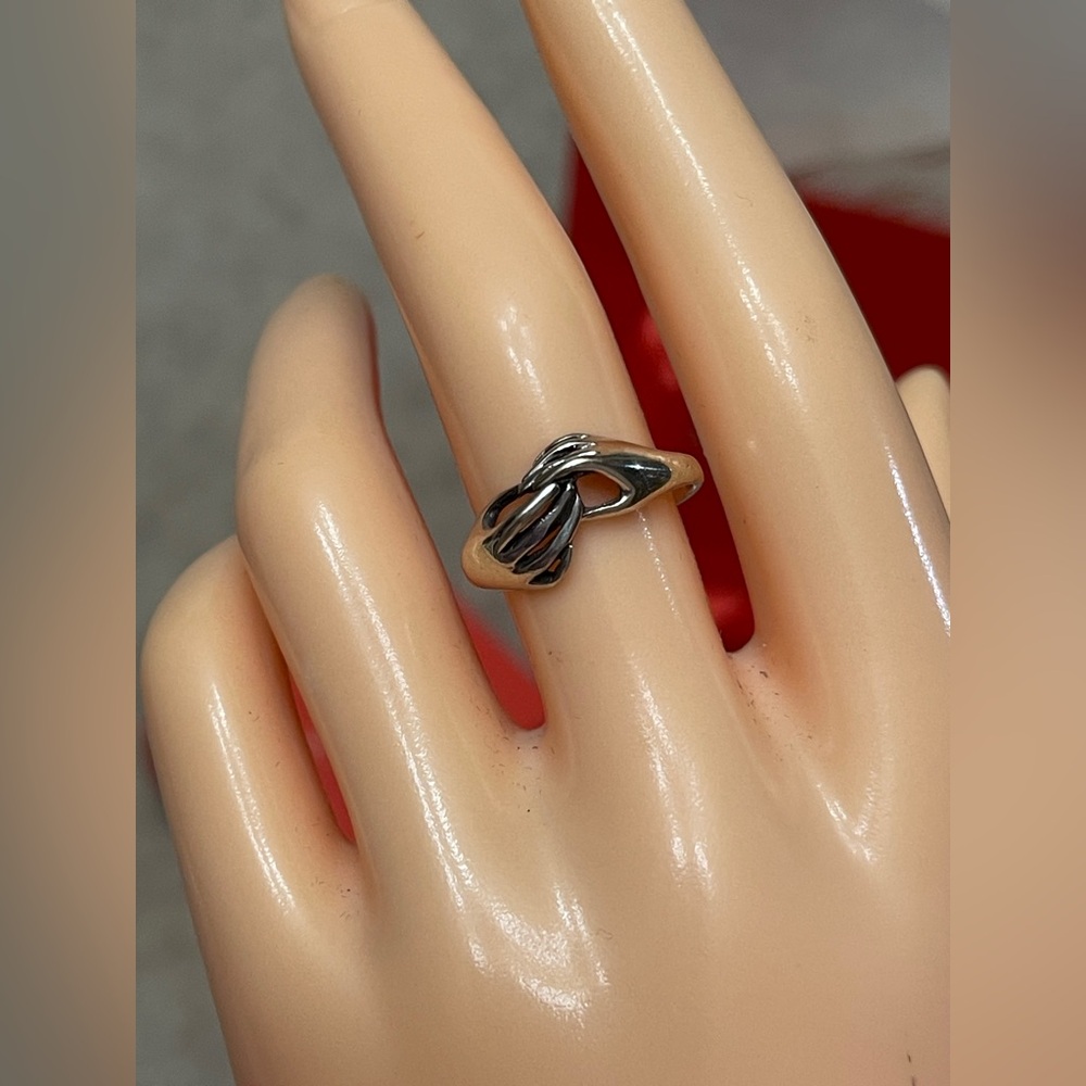 James Avery Retired Clasping Holding Hands
Sterling 3D size 7.25 with box & bag